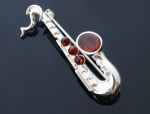 Broszka- srebrny saksofon z bursztynem AC74