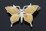 Srebrna broszka motyl z żółtym bursztynem
