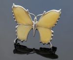 Srebrny motyl z żółtym bursztynem - broszka